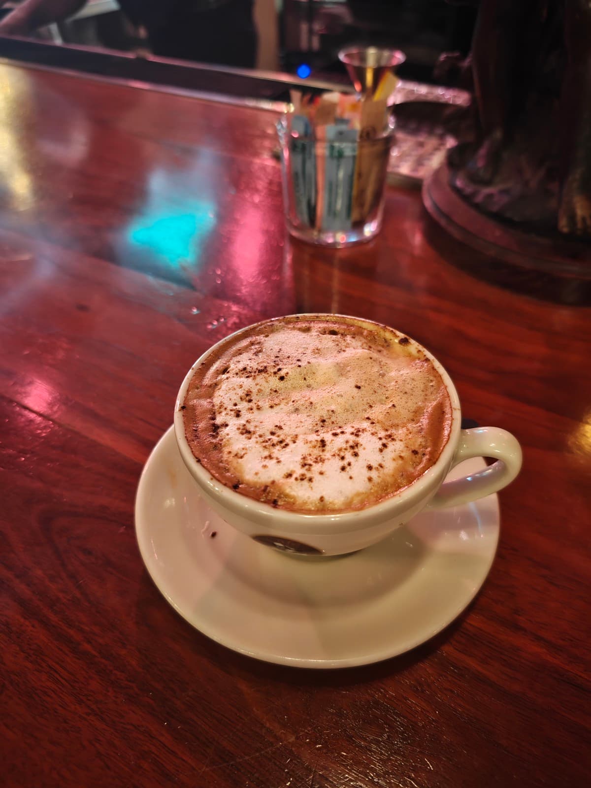 A cappuccino on a bar counter